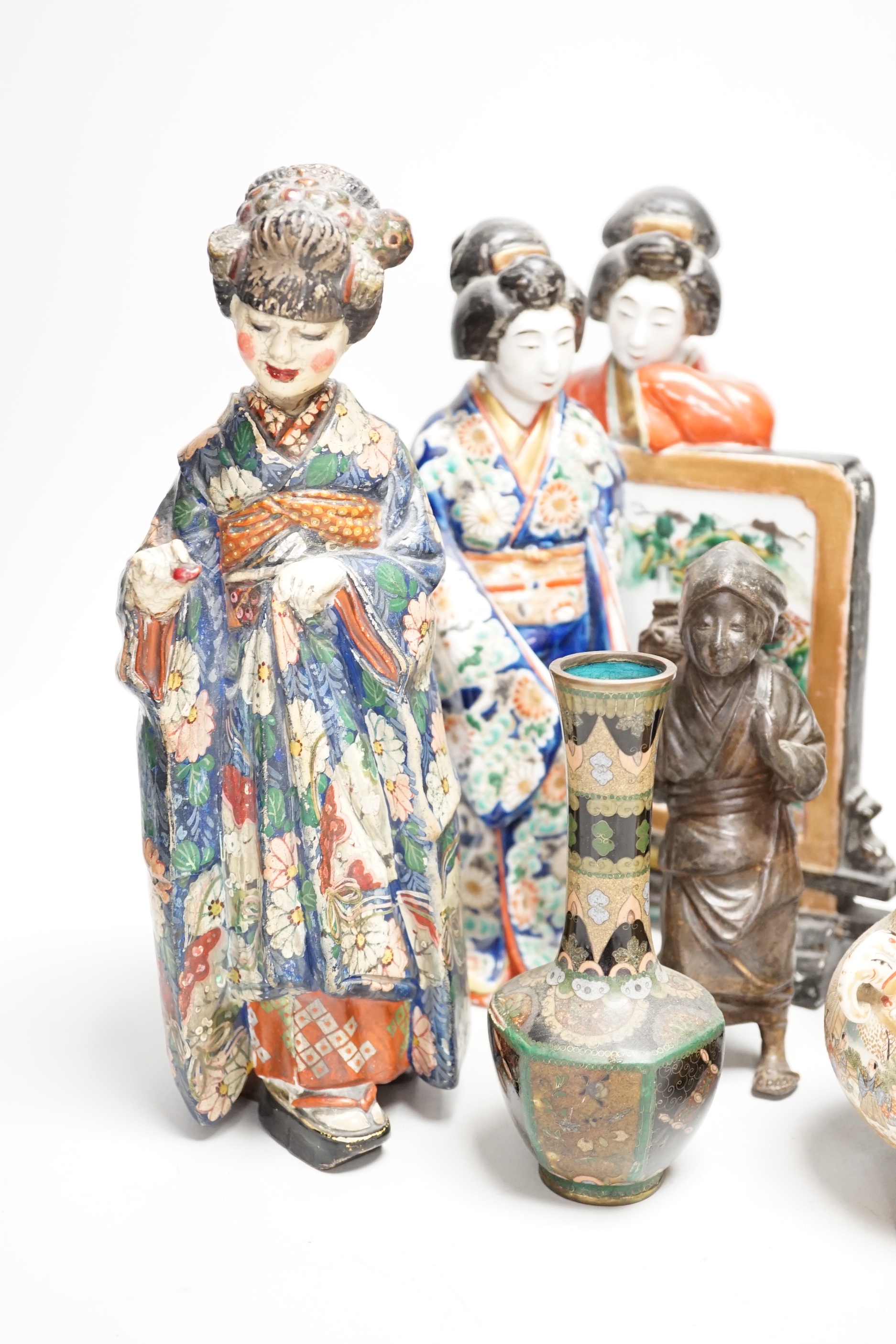 A collection of Japanese figures and three cloisonné enamel vases etc (7) including a Kutani group of two bijin by a table screen, tallest 28cm
